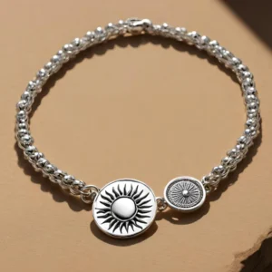 Pulsera plateada sol