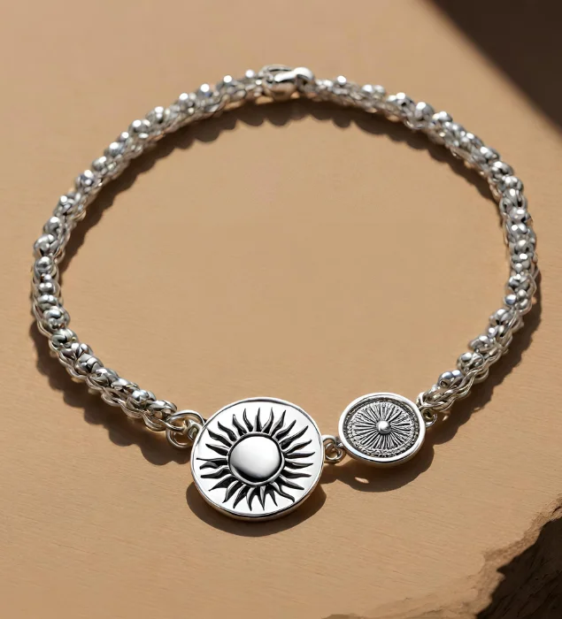Pulsera plateada sol